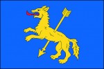 Šípem prostřelený vlk na vlajce Rýmařova, okres Bruntál, udělené r. 1994