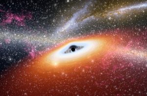 Umělecká představa superhmotné černé díry v centru Galaxie. Zdroj: UniverseToday.com.