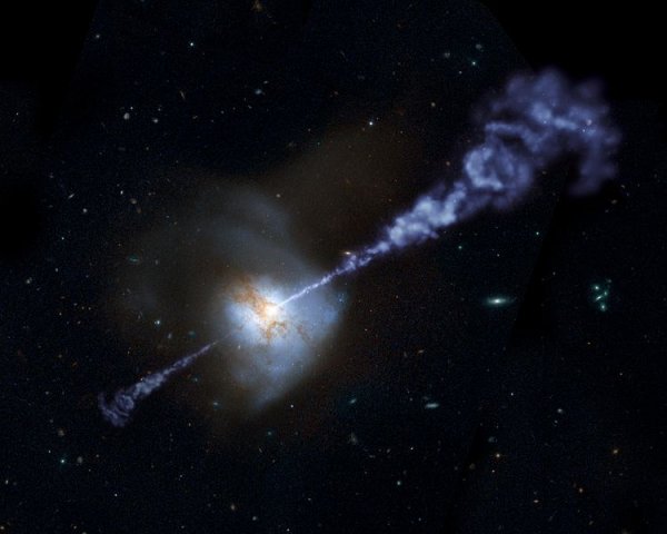 Malířova představa výtrysků z galaxie Arp 220, jejíž snímek byl zachycen Hubbleovým kosmickým dalekohledem, jejíž aktivní galaktické jádro bylo studováno dalekohledem Herschel v infračerveném spektru. 