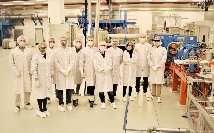 A photo of the Ion Acceleration and Applications of High Energy Particles team in charge of the ELIMAIA ion beamline user operations